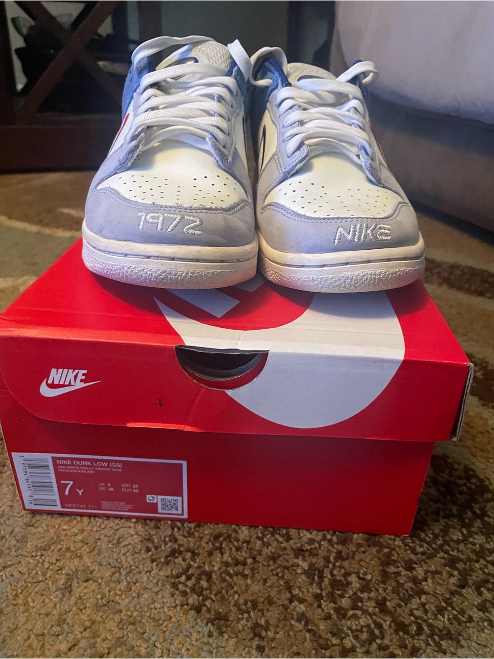 Nike Menโs Dunk Low Sneakers in White and Light Blue